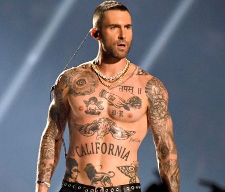 Adam Levine's bust with his tattoos